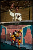 Puppeter handling traditional burmese string marionette. Mandalay, Myanmar ( color)