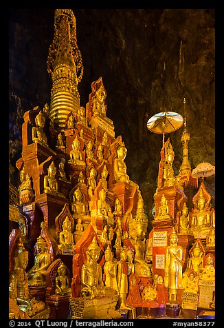 Many buddha images surround main stupa in Pindaya Caves. Pindaya, Myanmar (color)