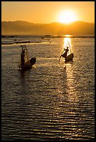 Intha fishermen with setting sun. Inle Lake, Myanmar ( color)