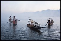 Group of Intha fishermen on misty waters. Inle Lake, Myanmar ( color)