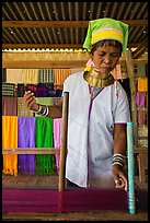Padaung (long neck) woman threading yarn. Inle Lake, Myanmar ( color)