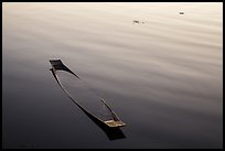Sunken canoe and ripples. Inle Lake, Myanmar ( color)