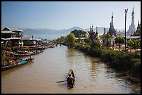 Boats and stupas bordering Ywama Village canal. Inle Lake, Myanmar ( color)