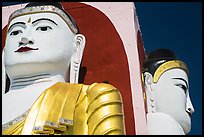 Detail of two of the four seated buddhas in  Kyaik Pun Paya. Bago, Myanmar ( color)