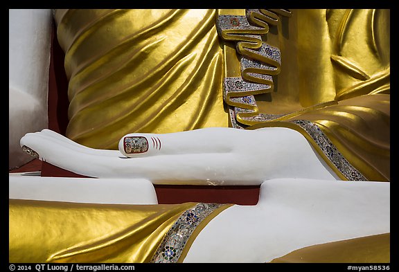 Detail of hand, of one of the four seated buddhas in  Kyaik Pun Paya. Bago, Myanmar (color)