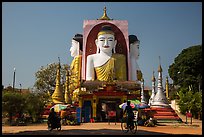 Four buddhas sitting back to back to four directions, Kyaik Pun Pagoda. Bago, Myanmar ( color)