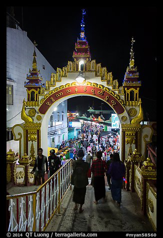 Entrance to Potemkin village of restaurants and souvenir shops. Kyaiktiyo, Myanmar (color)
