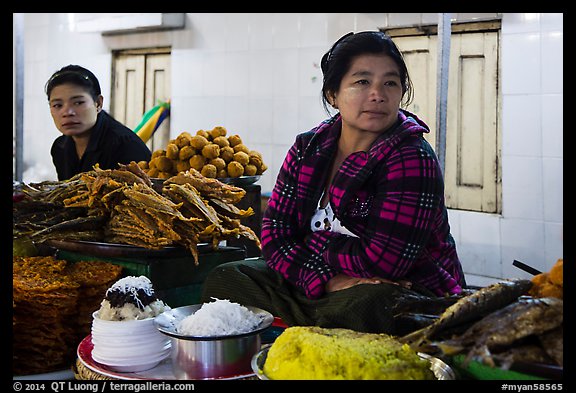Women at street food stalls, Potemkin village. Kyaiktiyo, Myanmar (color)