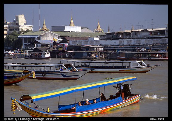 Flotilla of boats on the Chao Phraya river. Bangkok, Thailand (color)