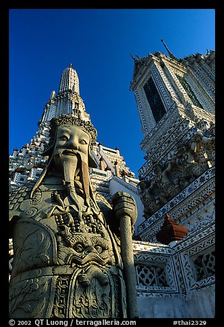 Statue and tower, Wat Arun. Bangkok, Thailand (color)