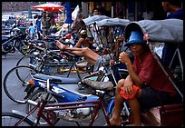 Tricycle drivers. Nakkhon Pathom, Thailand (color)