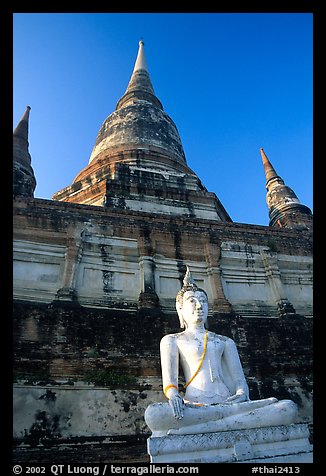 Buddha statue and Wat Chai Mongkon. Ayutthaya, Thailand (color)