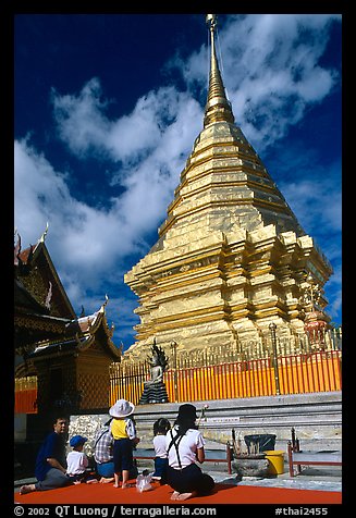 Worshipers at the Chedi of Wat Phra That Doi Suthep. Chiang Mai, Thailand