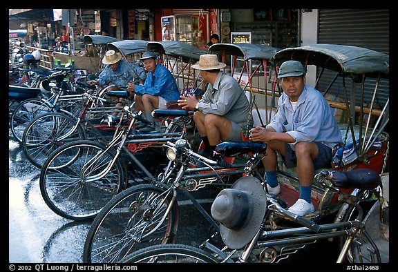 Tricycle drivers. Chiang Rai, Thailand (color)