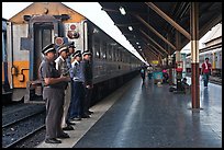 Train platform and attendants. Bangkok, Thailand (color)