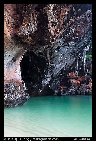 Limestone overhang and turquoise waters, Rai Leh. Krabi Province, Thailand (color)