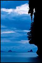 Seascape with limestone islets, stalactite, dusk, Andamam Sea. Krabi Province, Thailand (color)