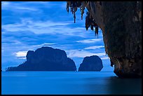 Limestone stalactite framing islets, Rai Leh. Krabi Province, Thailand (color)