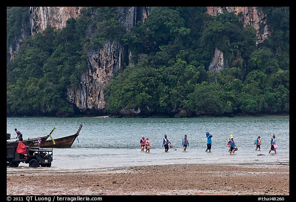 Disembarking at low tide, Rai Leh East. Krabi Province, Thailand (color)