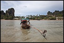 Tail of boat, and Railay East. Krabi Province, Thailand (color)