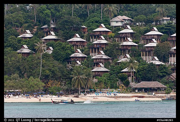 Beach and hillside bungalows on stilts, Ko Phi-Phi island. Krabi Province, Thailand