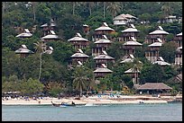 Beach and hillside bungalows on stilts, Ko Phi-Phi island. Krabi Province, Thailand (color)