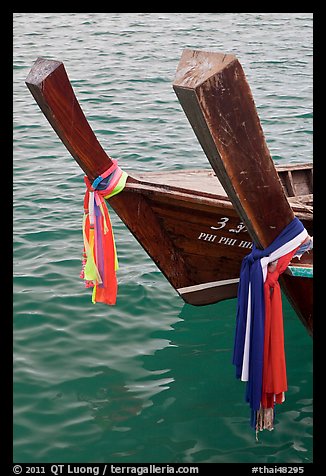 Ribons on prow of two longtail boats, Ko Phi-Phi Don. Krabi Province, Thailand (color)