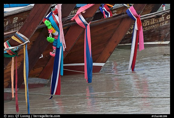Prows of longtail boats with garlands, Ko Phi-Phi Don. Krabi Province, Thailand