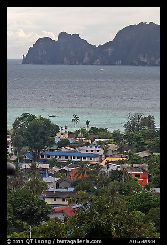 Village, bay and cliffs, Ko Phi-Phi island. Krabi Province, Thailand (color)