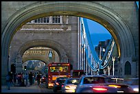Arches and car traffic on the Tower Bridge at nite. London, England, United Kingdom (color)