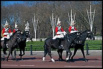 Horse guards riding near Buckingham Palace. London, England, United Kingdom (color)