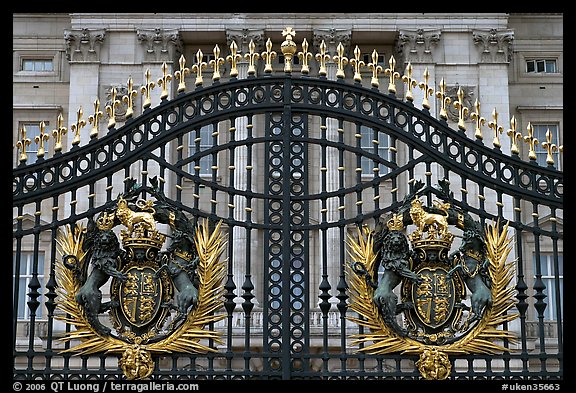 Entrance grids of Buckingham Palace with royalty emblems. London, England, United Kingdom