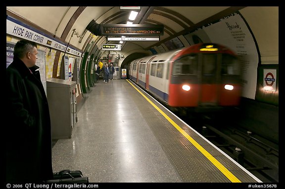 Man waiting for approaching train at Hyde Park subway station. London, England, United Kingdom (color)
