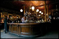 Central horseshoe bar in the 19th century victorian  pub Princess Louise. London, England, United Kingdom (color)