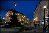 Eros statue and streets at dusk, Picadilly Circus. London, England, United Kingdom (color)