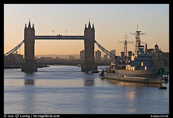 London Bridge, River Thames, and cruiser HMS Belfast at sunrise. London, England, United Kingdom (color)