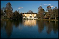 Museum No 1 reflected in lake, late afternoon. Kew Royal Botanical Gardens,  London, England, United Kingdom (color)