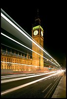 Lights from a moving bus, Houses of Parliament, and Big Ben at night. London, England, United Kingdom ( color)