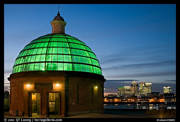 Entrance of foot tunnel under the Thames and Docklands buildings at dusk. Greenwich, London, England, United Kingdom