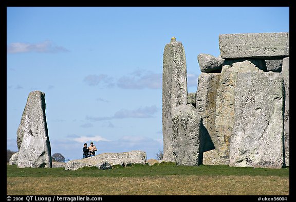 Couple looking at the standing stones, Stonehenge, Salisbury. England, United Kingdom (color)