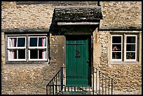 Windows and doorway entrance of stone house, Lacock. Wiltshire, England, United Kingdom ( color)