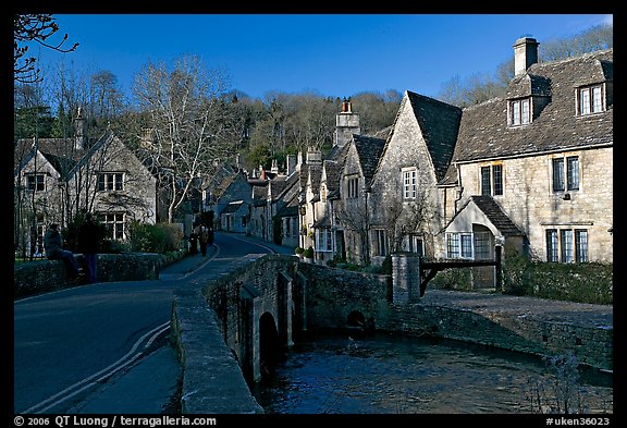 Packbridge crossing the Bybrook River and main street, Castle Combe. Wiltshire, England, United Kingdom (color)