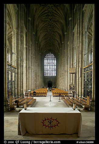Altar, soaring arches of the Nave, and stained glass, Canterbury Cathedral. Canterbury,  Kent, England, United Kingdom