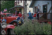 Vintage cars and houses on main street. McCarthy, Alaska, USA (color)