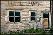 Windows and doors of old hardware store. McCarthy, Alaska, USA
