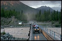 Four wheeler crossing the footbridge. McCarthy, Alaska, USA