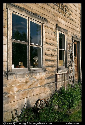 Windows and doors of old wooden building. McCarthy, Alaska, USA (color)
