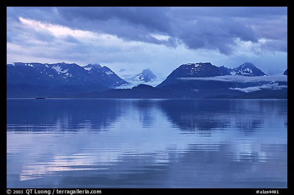 Kenai Mountains reflected in Katchemak Bay. Homer, Alaska, USA (color)
