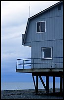House on stilts on the Spit. Homer, Alaska, USA (color)
