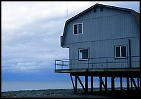Watefront house on stilts on the Spit. Homer, Alaska, USA (color)